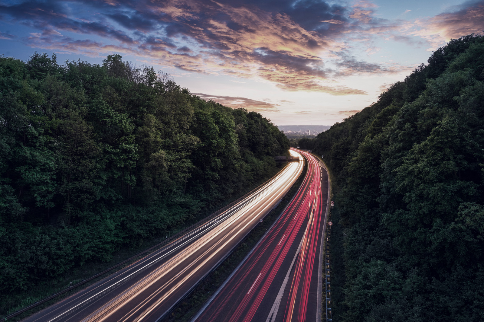 Light strips of cars on the motorway near Aachen and Cologne